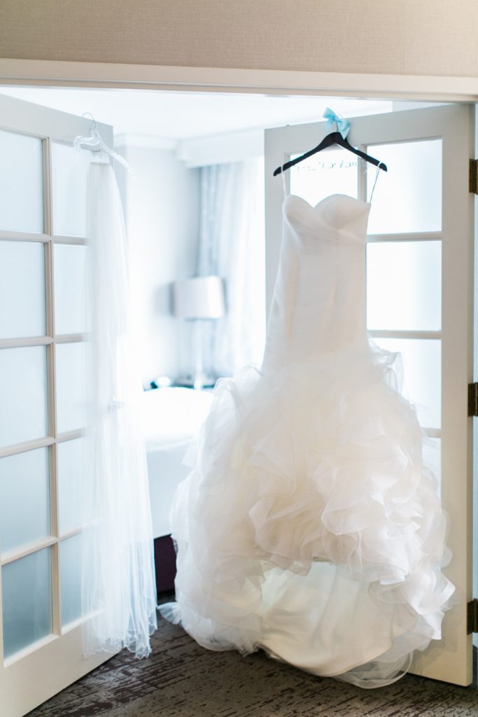 bride's wedding dress hanging
