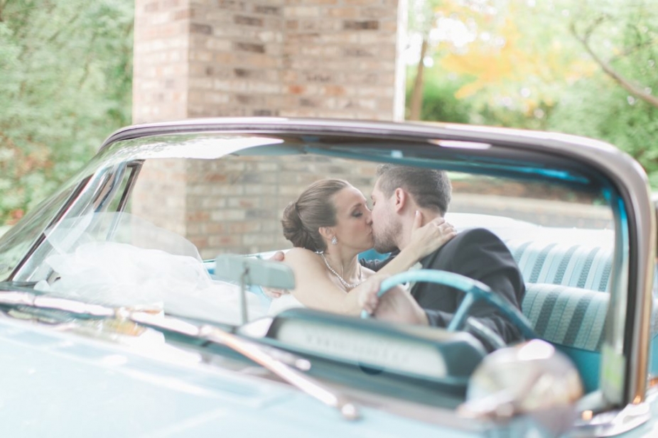 bride and groom vintage car