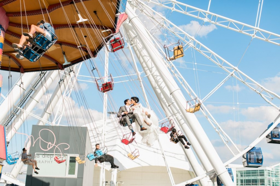wedding couple on carnival swing navy pier chicago